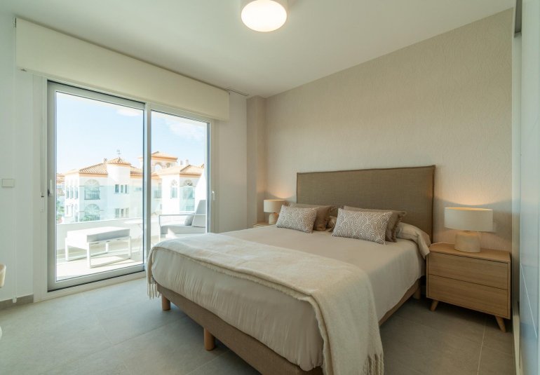 Obra nueva - Piso -
Orihuela Costa - Playa Flamenca