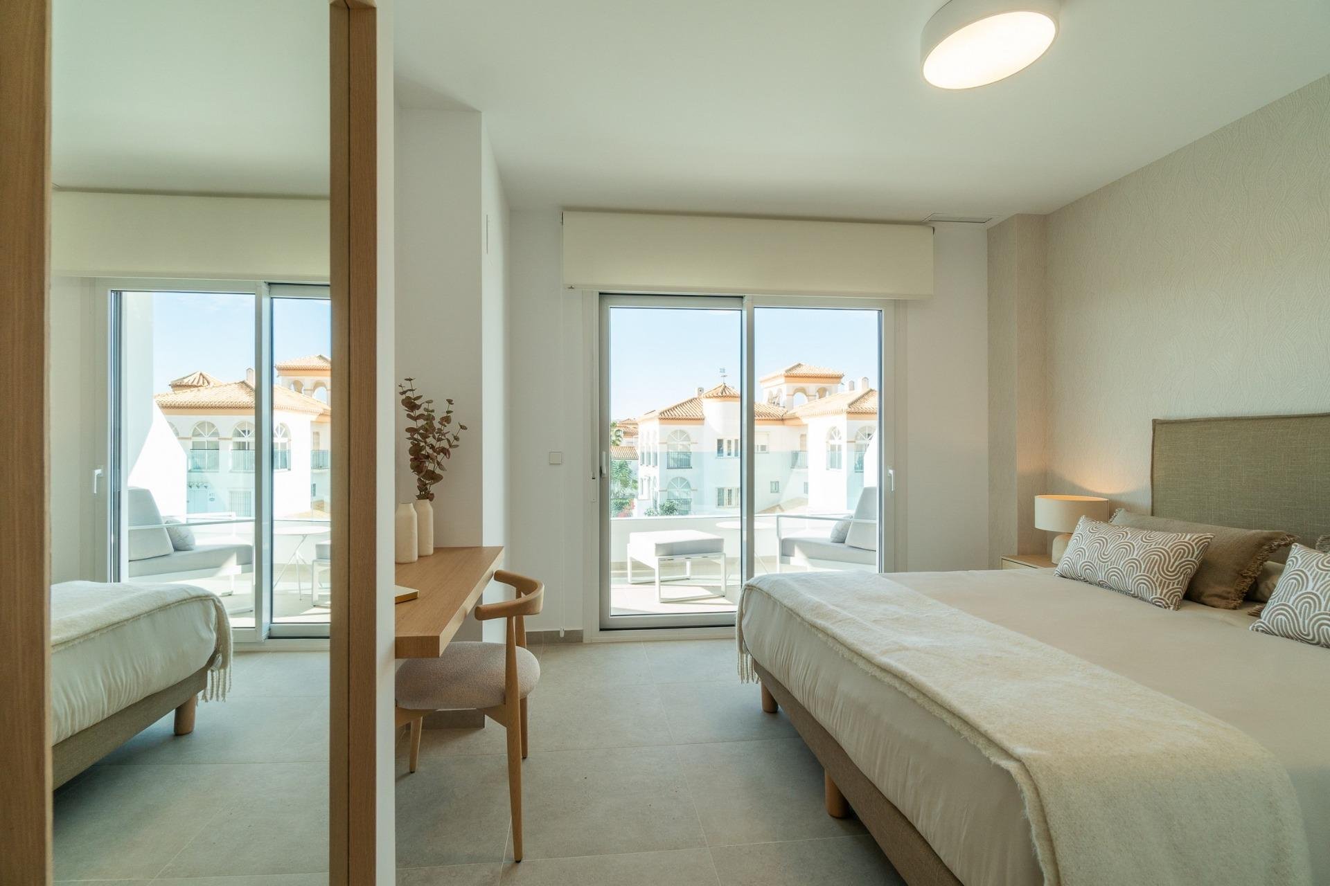 Obra nueva - Piso -
Orihuela Costa - Playa Flamenca