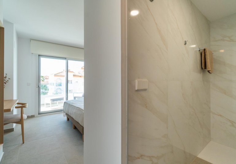 Obra nueva - Piso -
Orihuela Costa - Playa Flamenca