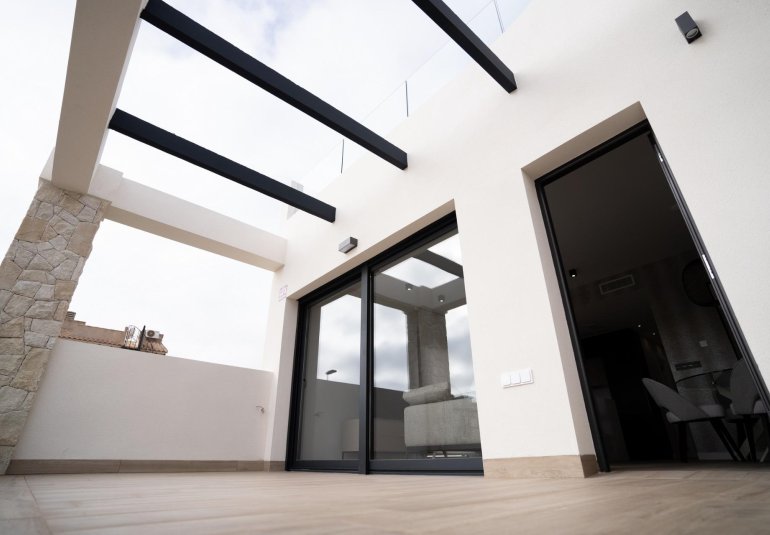 Obra nueva - Town House -
Orihuela Costa - Entre golf